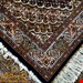 اندازه ذرع و نیم 1.5 متری 40 رج با پشم مرغویب ایرانی تک گره ترکی (تضمینی) رنگ متن سرمه ای حاشیه افسری و ترنج کرم 7 متن رنگی 28 رنگ پشم و 1 رنگ ابریشم جدیدترین نقشه ماهی کمال الملک خوی رنگرزی شده بصورت سنتی تضمین کیفیت بافت همراه با قید در فاکتور  