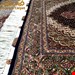 اندازه ذرع و نیم 1.5 متری 50 رج با پشم مرینوس پرویزیان (7لا) تک گره ترکی (تضمینی) رنگ متن سرمه ای، حاشیه افسری و ترنج پیازی ۷ متن رنگی 28 رنگ پشم و 3 رنگ ابریشم جدیدترین نقشه ماهی کمال الملک خوی رنگرزی شده توسط دستگاه اشلاپ فورس با پودر صیبای آلمانی تضمین کیفیت بافت همراه با قید در فاکتور 