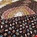 اندازه ذرع و نیم 1.5 متری 50 رج با پشم مرینوس پرویزیان (7لا) تک گره ترکی (تضمینی) رنگ متن سرمه ای، حاشیه افسری و ترنج پیازی ۷ متن رنگی 28 رنگ پشم و 3 رنگ ابریشم جدیدترین نقشه ماهی کمال الملک خوی رنگرزی شده توسط دستگاه اشلاپ فورس با پودر صیبای آلمانی تضمین کیفیت بافت همراه با قید در فاکتور 