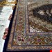 اندازه ذرع و نیم 1.5 متری 40 رج با پشم مرینوس نیوزلندی تک گره ترکی (تضمینی) رنگ متن سرمه ایحاشیه افسری و ترنج کرم 7 متن رنگی 28 رنگ پشم و 3 رنگ ابریشم جدیدترین نقشه ماهی کمال الملک خوی رنگرزی شده توسط دستگاه اشلاپ فورس با پودر صیبای آلمانی تضمین کیفیت بافت همراه با قید در فاکتور 