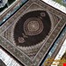 اندازه قالیچه 3 متری 40 رج با پشم مرینوس پرویزیان (7لا) طرح گل 50 رج تک گره ترکی (تضمینی) رنگ متن سرمه ای، حاشیه افسری و ترنج پیازی 11 متن رنگی 28 رنگ پشم و 3 رنگ ابریشم جدیدترین نقشه ماهی کمال الملک خوی رنگرزی شده توسط دستگاه اشلاپ فورس با پودر صیبای آلمانی تضمین کیفیت بافت همراه با قید در فاکتور 