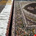 اندازه قالیچه 3 متری 40 رج با پشم مرینوس پرویزیان (7لا) طرح گل 50 رج تک گره ترکی (تضمینی) رنگ متن سرمه ای، حاشیه افسری و ترنج پیازی 11 متن رنگی 28 رنگ پشم و 3 رنگ ابریشم جدیدترین نقشه ماهی کمال الملک خوی رنگرزی شده توسط دستگاه اشلاپ فورس با پودر صیبای آلمانی تضمین کیفیت بافت همراه با قید در فاکتور 