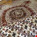 اندازه قالیچه 3 متری 40 رج با پشم مرغوب ایرانی تک گره ترکی (تضمینی) رنگ متن کرم، حاشیه افسری و ترنج پیازی 11 متن رنگی 28 رنگ پشم و 1 رنگ ابریشم جدیدترین نقشه ماهی کمال الملک خوی رنگرزی شده بصورت سنتی تضمین کیفیت بافت همراه با قید در فاکتور  