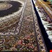 اندازه قالیچه 3 متری 40 رج با پشم مرینوس پرویزیان (7لا) طرح گل 50 رج تک گره ترکی (تضمینی) رنگ متن سرمه ای، حاشیه افسری و ترنج پیازی 11 متن رنگی 28 رنگ پشم و 3 رنگ ابریشم جدیدترین نقشه ماهی کمال الملک خوی رنگرزی شده توسط دستگاه اشلاپ فورس با پودر صیبای آلمانی تضمین کیفیت بافت همراه با قید در فاکتور 
