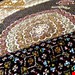 اندازه قالیچه 3 متری 40 رج با پشم مرغوب ایرانی تک گره ترکی (تضمینی) رنگ متن سرمه ای، حاشیه افسری و ترنج کرم 11 متن رنگی 28 رنگ پشم و 1 رنگ ابریشم جدیدترین نقشه ماهی کمال الملک خوی رنگرزی شده بصورت سنتی تضمین کیفیت بافت همراه با قید در فاکتور 