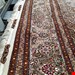 اندازه جفت 9 متری 40 رج با پشم مرینوس پرویزیان (7لا) طرح گل 50 رج تک گره ترکی (تضمینی) رنگ متن کرم، حاشیه افسری و ترنج پیازی 15 متن رنگی 28 رنگ پشم و 3 رنگ ابریشم جدیدترین نقشه ماهی کمال الملک خوی رنگرزی شده توسط دستگاه اشلاپ فورس با پودر صیبای آلمانی تضمین کیفیت بافت همراه با قید در فاکتور