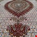 اندازه جفت 6 متری 40 رج با پشم مرینوس پرویزیان (7لا) طرح گل 50 رج تک گره ترکی (تضمینی) رنگ متن کرم، حاشیه افسری و ترنج پیازی 15 متن رنگی 28 رنگ پشم و 3 رنگ ابریشم جدیدترین نقشه ماهی کمال الملک خوی رنگرزی شده توسط دستگاه اشلاپ فورس با پودر صیبای آلمانی تضمین کیفیت بافت همراه با قید در فاکتور  