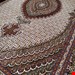 اندازه جفت 6 متری 40 رج با پشم مرینوس پرویزیان (7لا) طرح گل 50 رج تک گره ترکی (تضمینی) رنگ متن کرم، حاشیه افسری و ترنج پیازی 15 متن رنگی 28 رنگ پشم و 3 رنگ ابریشم جدیدترین نقشه ماهی کمال الملک خوی رنگرزی شده توسط دستگاه اشلاپ فورس با پودر صیبای آلمانی تضمین کیفیت بافت همراه با قید در فاکتور    