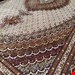  اندازه جفت 6 متری 40 رج با پشم مرینوس پرویزیان (7لا) طرح گل 50 رج تک گره ترکی (تضمینی) رنگ متن کرم، حاشیه افسری و ترنج پیازی 13 متن رنگی 28 رنگ پشم و 3 رنگ ابریشم جدیدترین نقشه ماهی کمال الملک خوی رنگرزی شده توسط دستگاه اشلاپ فورس با پودر صیبای آلمانی تضمین کیفیت بافت همراه با قید در فاکتور