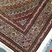  اندازه جفت 6 متری 40 رج با پشم مرینوس پرویزیان (7لا) طرح گل 50 رج تک گره ترکی (تضمینی) رنگ متن کرم، حاشیه افسری و ترنج پیازی 13 متن رنگی 28 رنگ پشم و 3 رنگ ابریشم جدیدترین نقشه ماهی کمال الملک خوی رنگرزی شده توسط دستگاه اشلاپ فورس با پودر صیبای آلمانی تضمین کیفیت بافت همراه با قید در فاکتور          