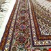  اندازه قالیچه 3 متری 40 رج با پشم مرینوس پرویزیان (7لا) طرح گل 50 رج تک گره ترکی (تضمینی) رنگ متن کرم، حاشیه افسری و ترنج پیازی 11 متن رنگی 28 رنگ پشم و 3 رنگ ابریشم جدیدترین نقشه ماهی کمال الملک خوی رنگرزی شده توسط دستگاه اشلاپ فورس با پودر صیبای آلمانی تضمین کیفیت بافت همراه با قید در فاکتور            