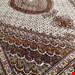  اندازه جفت قالیچه 3 متری 40 رج با پشم مرینوس پرویزیان (7لا) طرح گل 50 رج تک گره ترکی (تضمینی) رنگ متن  کرم، حاشیه افسری و ترنج پیازی 11 متن رنگی 28 رنگ پشم و 3 رنگ ابریشم جدیدترین نقشه ماهی کمال الملک خوی رنگرزی شده توسط دستگاه اشلاپ فورس با پودر صیبای آلمانی تضمین کیفیت بافت همراه با قید در فاکتور                        