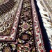  اندازه 1.5 متری 40 رج با پشم مرینوس پرویزیان (7لا) طرح گل 50 رج تک گره ترکی (تضمینی) رنگ متن سرمه ای، حاشیه سرمه ای و ترنج پیازی 9 متن رنگی 28 رنگ پشم و 3 رنگ ابریشم جدیدترین نقشه ماهی کمال الملک خوی رنگرزی شده توسط دستگاه اشلاپ فورس با پودر صیبای آلمانی تضمین کیفیت بافت همراه با قید در فاکتور                    