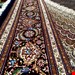  اندازه جفت 9 متری 40 رج با پشم مرینوس پرویزیان (7لا) طرح گل 50 رج تک گره ترکی (تضمینی) رنگ متن  سرمه ای، حاشیه افسری و ترنج پیازی 17 متن رنگی 28 رنگ پشم و 3 رنگ ابریشم جدیدترین نقشه ماهی کمال الملک خوی رنگرزی شده توسط دستگاه اشلاپ فورس با پودر صیبای آلمانی تضمین کیفیت بافت همراه با قید در فاکتو                 