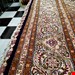  اندازه تک 9 متری 40 رج با پشم مرینوس پرویزیان (7لا) طرح گل 50 رج تک گره ترکی (تضمینی) رنگ متن  سرمه ای، حاشیه افسری و ترنج کرم 17 متن رنگی 28 رنگ پشم و 3 رنگ ابریشم جدیدترین نقشه ماهی کمال الملک خوی رنگرزی شده توسط دستگاه اشلاپ فورس با پودر صیبای آلمانی تضمین کیفیت بافت همراه با قید در فاکتور                      
